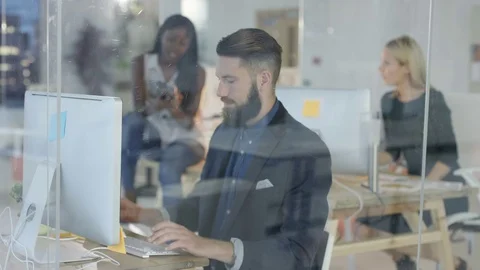 4K Cheerful creative design team brainst... | Stock Video | Pond5