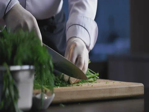 4k Chef professional cut with knife on kitchen Stock Footage 71623245