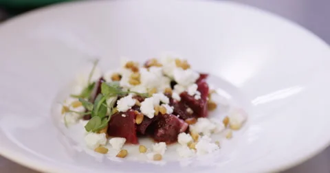 4k, Chef putting the final touches on a dinner plate in a professional kitchen. Stock Footage 62926089