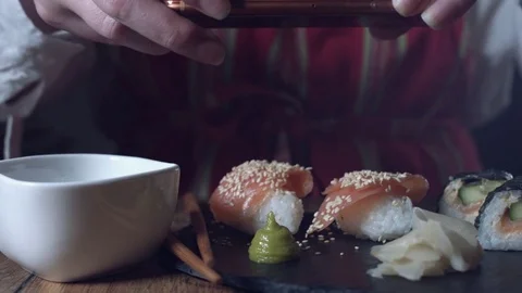 4K Chef Taking a Picture on Smartphone of Sushi Stock Footage 73702460