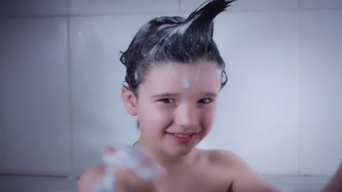 4k Child in Bath Playing with his Hair with Shampoo Stock Footage 73433369