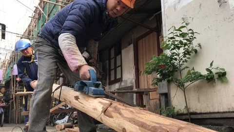 4k Chinese Asian Workers builder polishing Wood 30FPS Video stock 90912246
