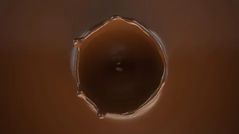 4k  choco dropping and splashing forming a beautiful crown splash Stock Footage 87570798