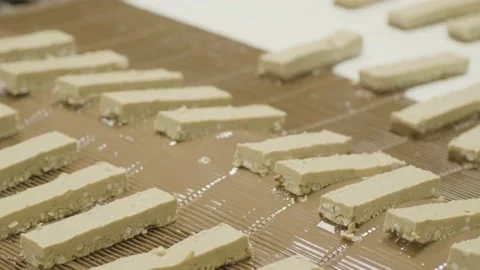 4K Chocolate Bars Coated on Bottom via Conveyor Belt Stock Footage 149016650