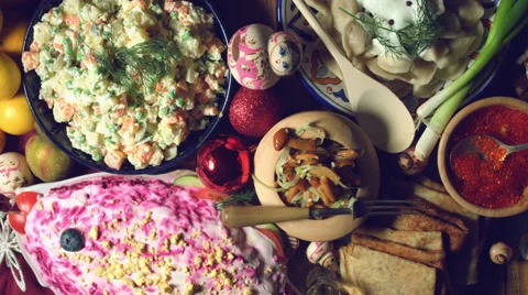 4k Christmas Food from Above Composition of Russian Traditional Dishes and Dolls Stock Footage