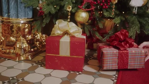 4K Christmas Gift Boxes Under Decorated Tree with Red Gold and Plaid 스톡 동영상 332157764