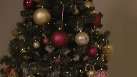 4K Christmas Tree Decorated in Classic Red and Green with Wrapped Gifts Stock-Footage 332157783