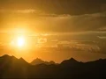 4K Cine gorgeous sunset over mountain silhouettes time lapse 2x 4k or 4k+ Resolution