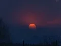 4K Cine sun glow behind clouds sunset time lapse 4k or 4k+ Resolution