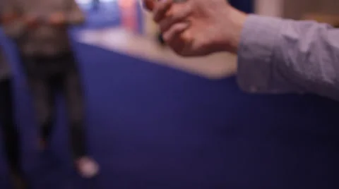 4K Cinema worker taking tickets from customers before they go into movie theatre Stock Footage 59708721