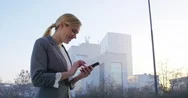 4K Cinemagraph: Business Woman Typing On Mobile Stock Footage