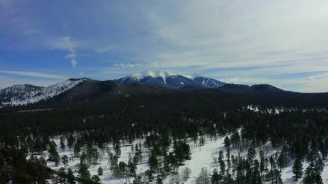 4k Cinematic Aerial Of Snow Covered Moutains Near Flagstaff, Arizona Stock Footage