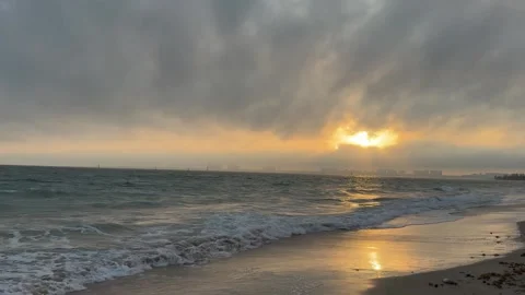 4K Cinematic Beach Sunset with Distant City Skyline in Hainan 库存影片 332039589