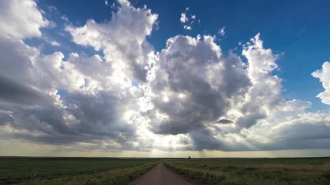 4K Cinematic Cumulus Developing into Storm With Sun Rays Timelapse - Prores Video stock 319858988