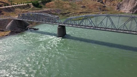 4K Cinematic Drone Flight Over River with Stone Bridge and Railway Bridge Stock-Footage 336217773