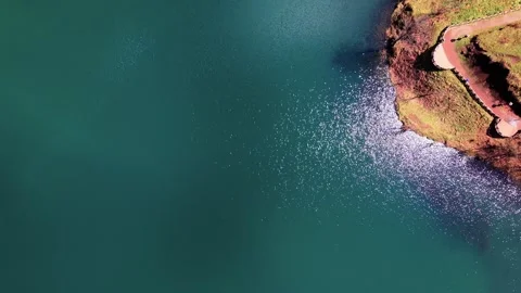 4K Cinematic Drone Orbit Ascending Above a Blue Autumn Lake Stock-Footage 339202821