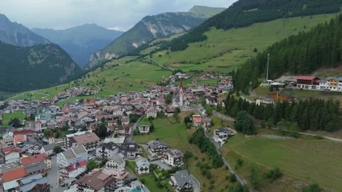 4K cinematic drone pull back over Nauders village in Tyrol Austria Stock Footage 340772297
