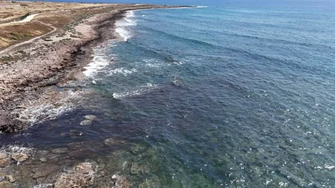 4K Cinematic Drone Pull-In Over Turquoise Waters Toward Paphos Coast Stock Footage 308017663
