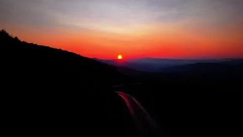 4K Cinematic Drone Side Tracking Car on Forest Road at Sunset Stock-Footage 336496926