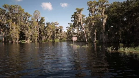 4K Cinematic drone video over the middle of Lake Minnehaha in Clermont, FL. Video stock 101577447