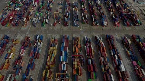 4K cinematic flyover top-down aerial view container shipping global trade 動画素材 316682176