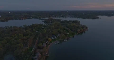 4K Cinematic Forward Aerial View of Fairview St Neighborhood On Lake Minnetonka Stock Footage 247874264