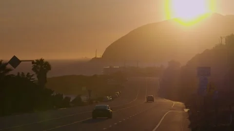 4K Cinematic Ground-Level Sunset on Malibu&amp;#039;s Iconic Pacific Coast Highway Stock Footage 316794786