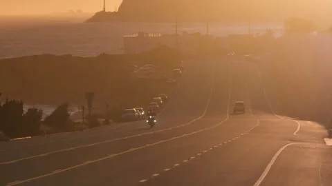 4K Cinematic Ground-Level Sunset on Malibu on Iconic Pacific Coast Highway Stock Footage 316794793