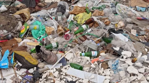 4K Cinematic Illegal Waste Dumping and Plastic Pollution Stock Footage 336414689