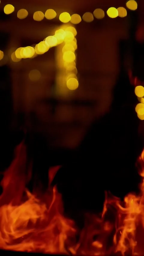 4K Cinematic Medium Shot of Bonfire with Glowing Embers and Flames at Night 库存影片 333442834