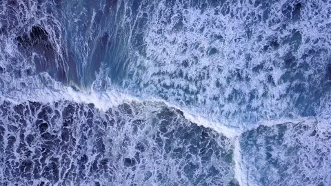 4K Cinematic ocean wave breaking - amazing swell patterns Stock Footage 77601523