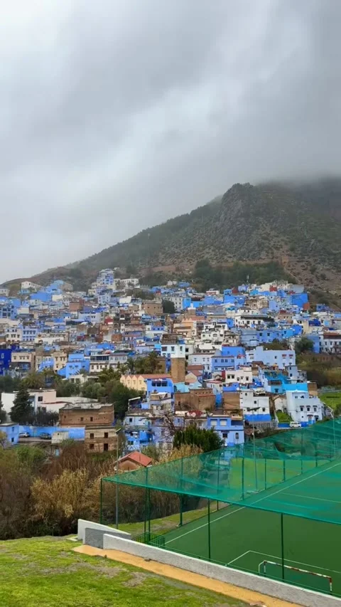 4K+ Cinematic Panoramic View of Blue City Chefchaouen Morocco Misty Mountains Stock Footage 327851051