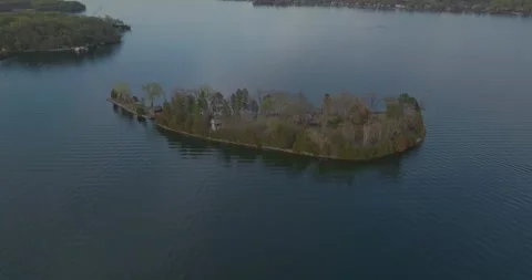 4K Cinematic Reverse Aerial View of Gale Island Lake Minnetonka Spring Evening Stock Footage 247872123
