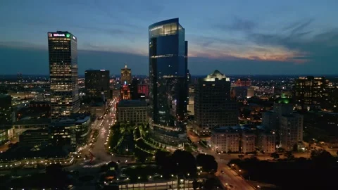4K Cinematic Reverse Descending Drone Shot Of Milwaukee Skyscrapers After Sunset Video stock 220469484