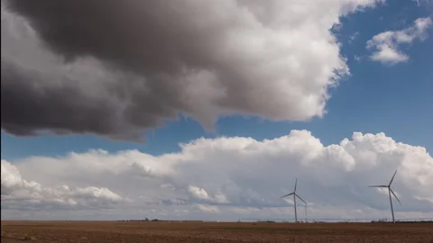4K Cinematic Storm Clouds Over Wind Farm Timelapse - Prores Stock Footage 319859536