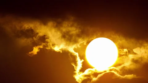 4K cinematic Sun movement close up through dark storm ominous clouds 30p Stock Footage 49579233