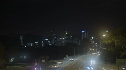 4K Cinematic Timelapse of freeway leading towards City Stock Footage 239221123