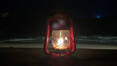 4K Cinematic Vintage Red Lantern Burning by the Night Sea Vídeos de archivo 332038448