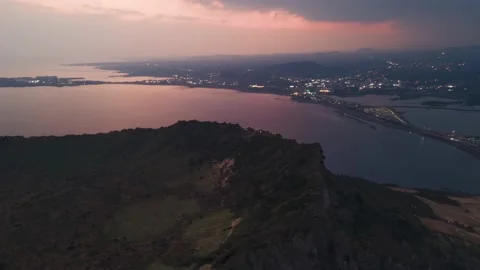 4K Circular Time-lapse Aerial View of Sunset at Seongsan Sunrise Peak--Wide Shot Stock Footage 145845577
