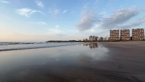 4K City Skyline Reflection on Beach at Blue Hour Stock Footage 334771916