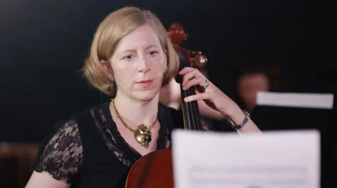 4K Classical cellist playing during orchestra performance Stock Footage 68705814