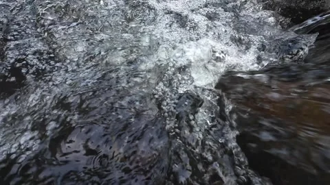4K Clear River Water Flowing Over Natural Rocks in Tropical Forest Stock Footage 336749796