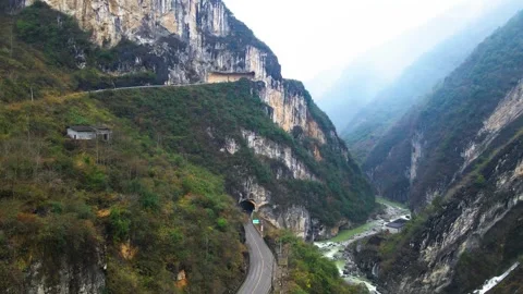 4K Cliffside Hanging Road Through Steep Mountain Canyon Stock Footage 320149906