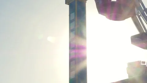 4K clip of an assortment of carnival style amusement park rides Stock Footage 74305688