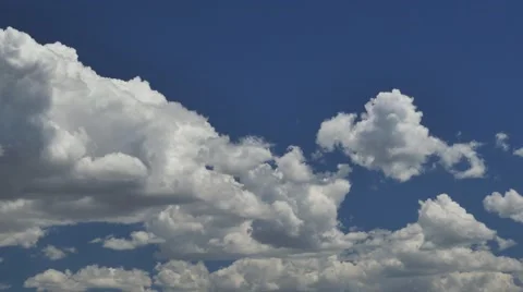 4K Clip of Lazy Cumulus Clouds in Sky on a Summer Day Stock Footage 54715347