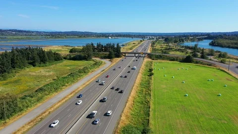 4k clip of a rural stretch of Interstate 5 with flowing traffic Stock Footage 113342827