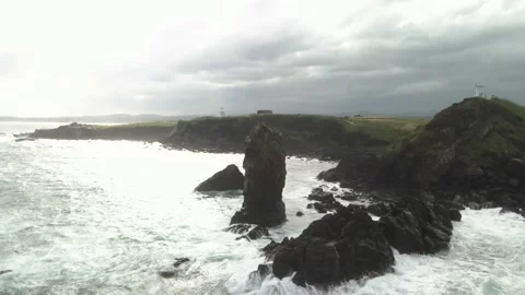 4K Clockwise Drone View of Seopjikoji's (섭지코지) Volcanic Rock Formations Stock Footage 143864006