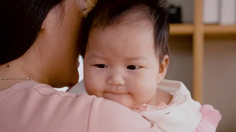 4K, Close Up A 3-month-old newborn Asian girl is crying Video stock 203893881