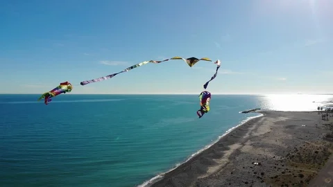 4K Close up of an aerial view of flying kite filmed by a drone in mid air .- Stock Footage 102086859