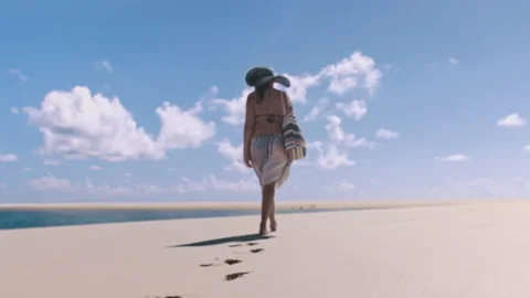 4k close of alone young beautiful woman feet walking on beautiful white beach wi Stock Footage 199624588